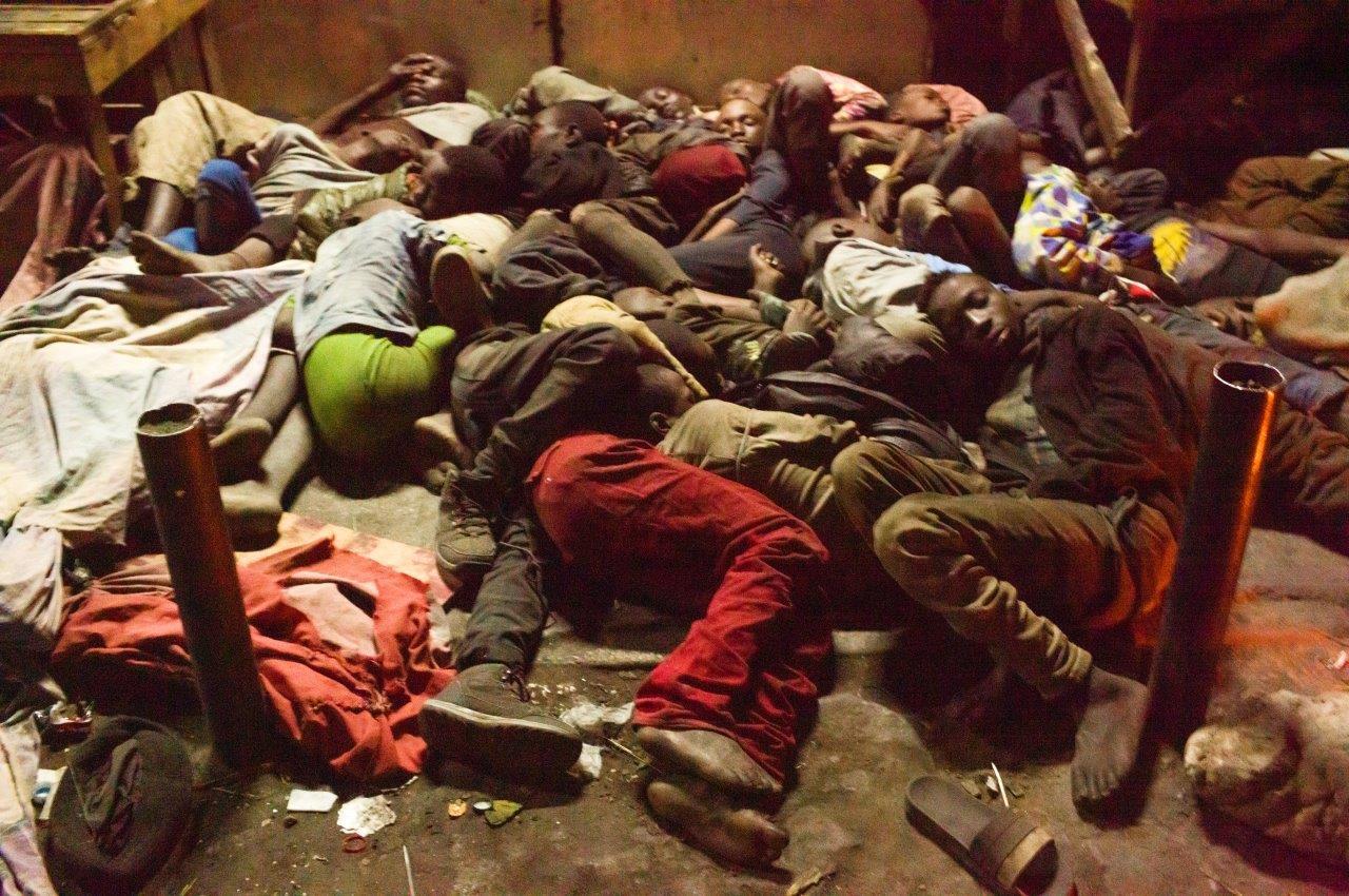 Life on the street in Lusaka - On the street the bodies are huddled together in a pile reminiscent of a mound of dead bodies.  