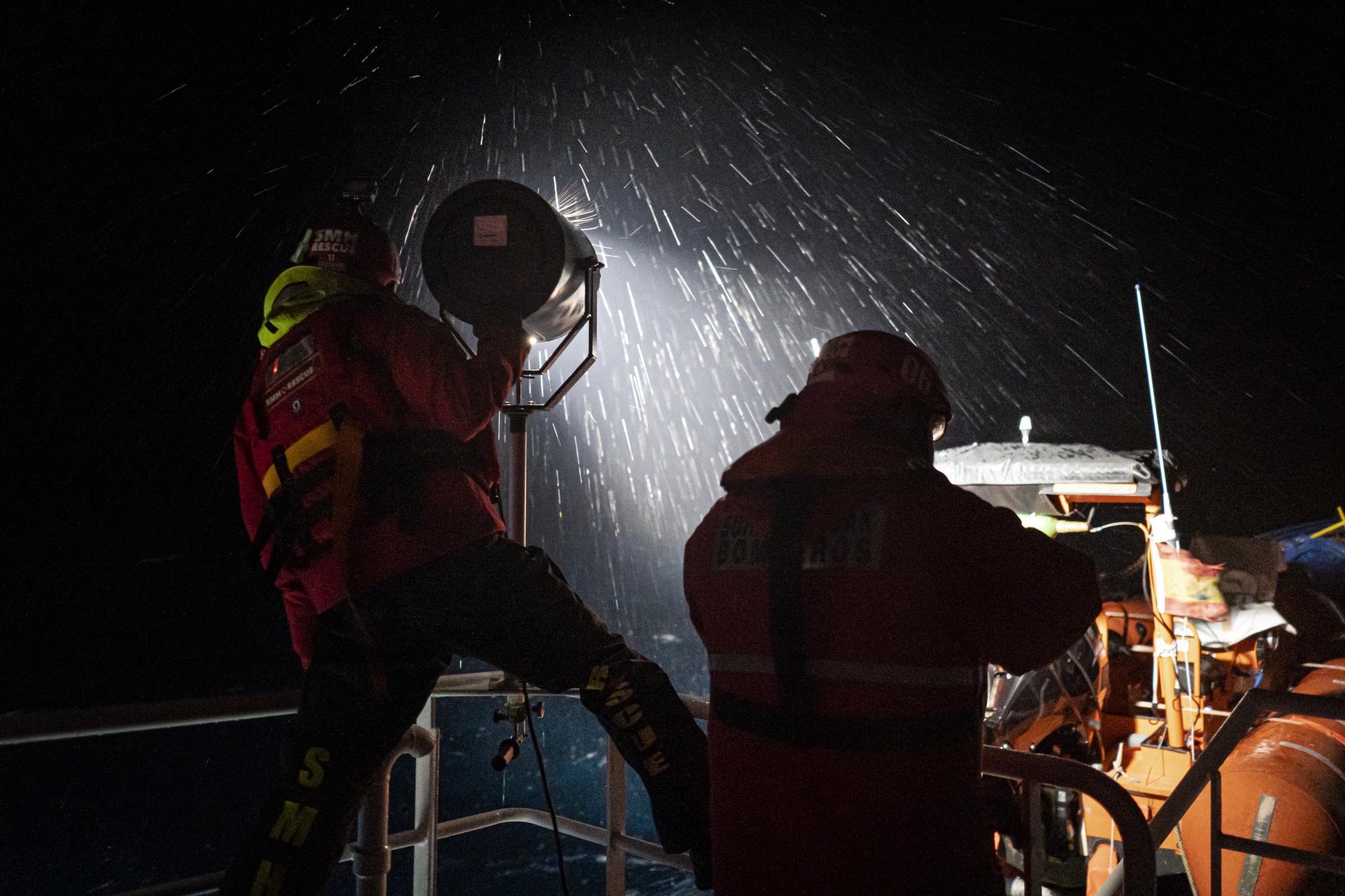  Edouard (left) and Pablo (right) shine a spotlight during the search for a drifting wooden boat...