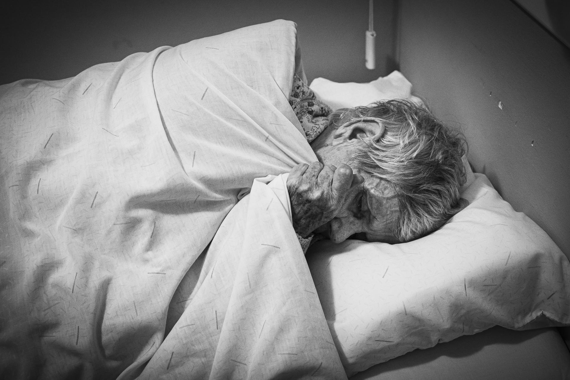  Fina gripping the bed sheet tightly as she tries to sleep. Although she sometimes sleeps...