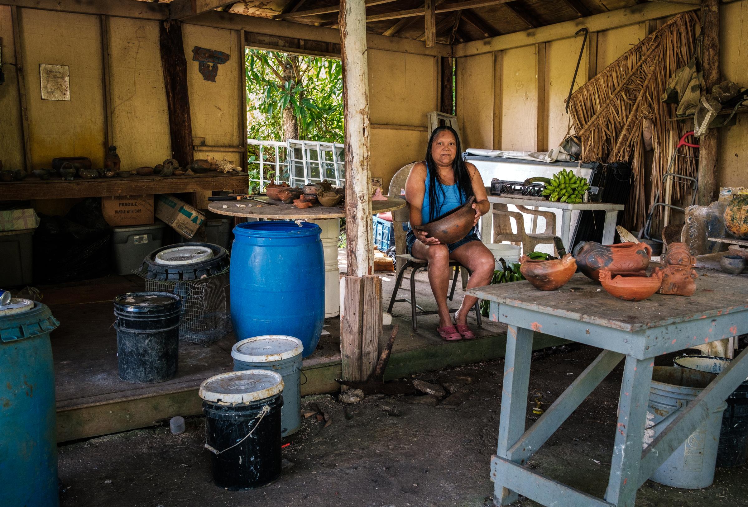 Survived by Few - Smithsonian Magazine Cover Story - Master potter Alice Ch&eacute;veres in her Ta&iacute;no Pottery workshop in Cabachuelas,...
