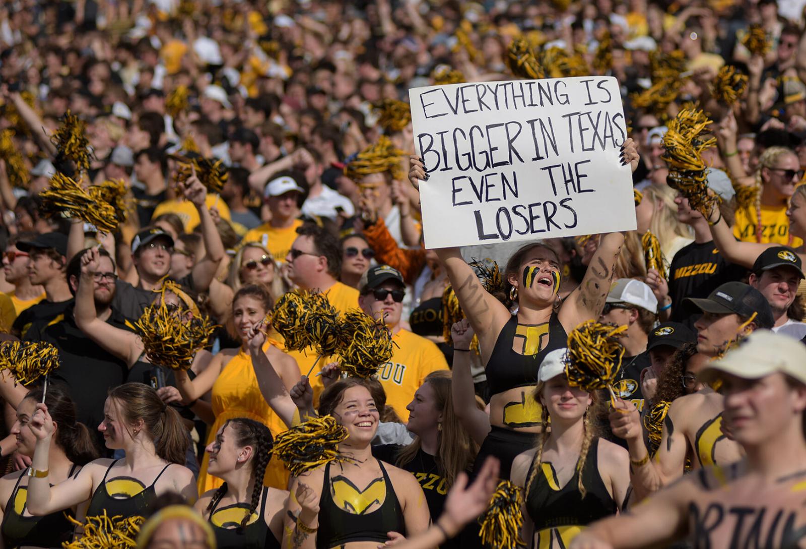 Fans cheer in the stands Saturd...a Tagliabue/Columbia Missourian