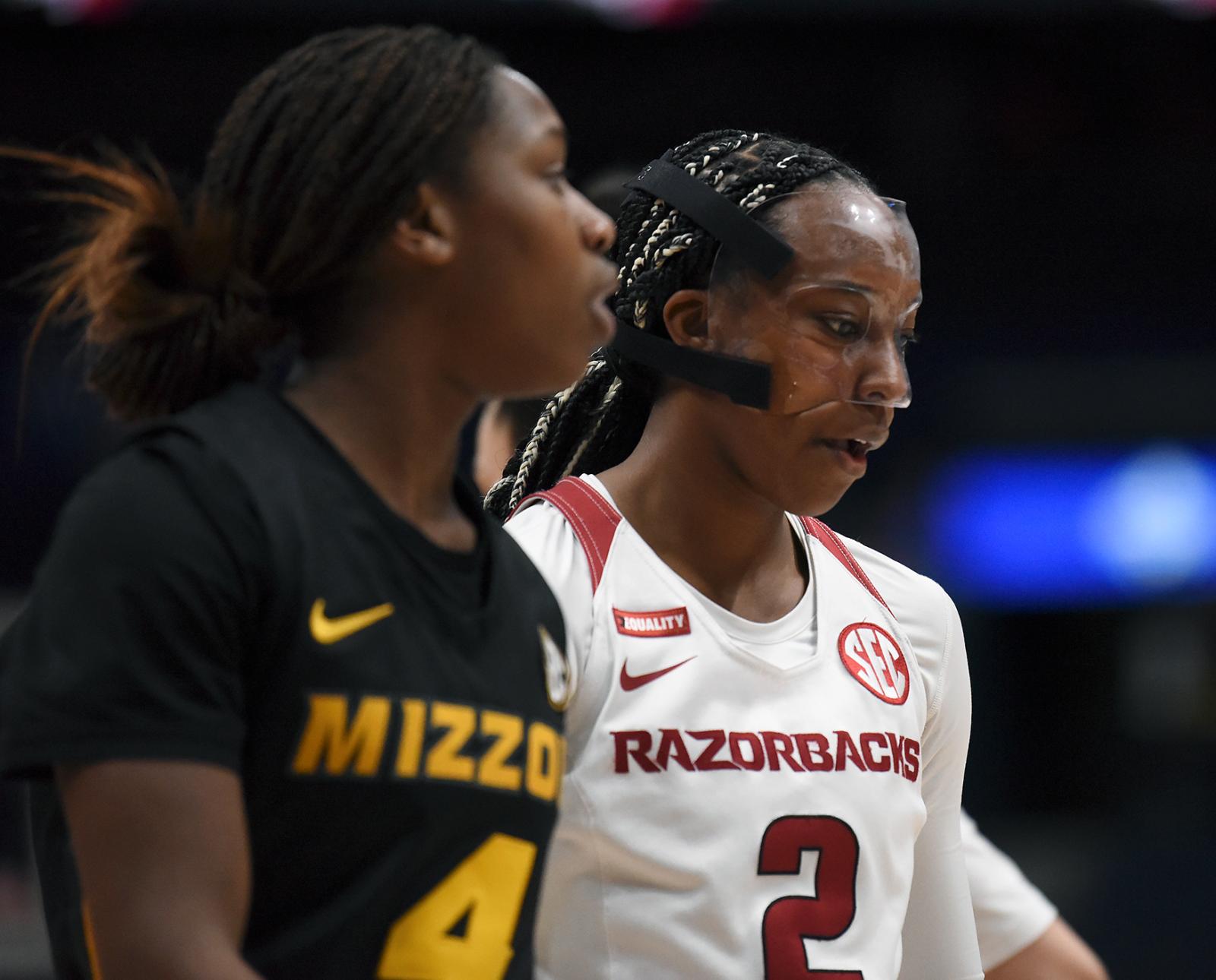 Samara Spencer, right, looks down at the court on Thursday, March 3, 2022 at Bridgestone Arena in Nashville. With the win against Missouri, Arkansas would then go on to lose to South Carolina in their following game.