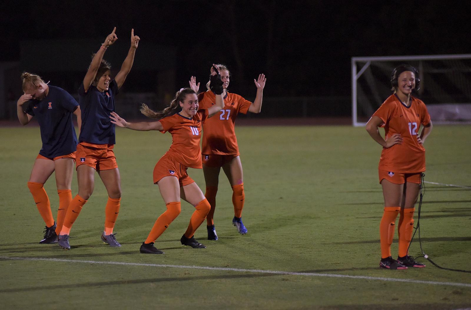 Illinois players dance behind Kendra Pasquale, far right, on Thursday, August 19, 2021 at Audrey J. Walton Soccer Stadium in Columbia. Pasquale had scored one goal during the game against Missouri.&nbsp;