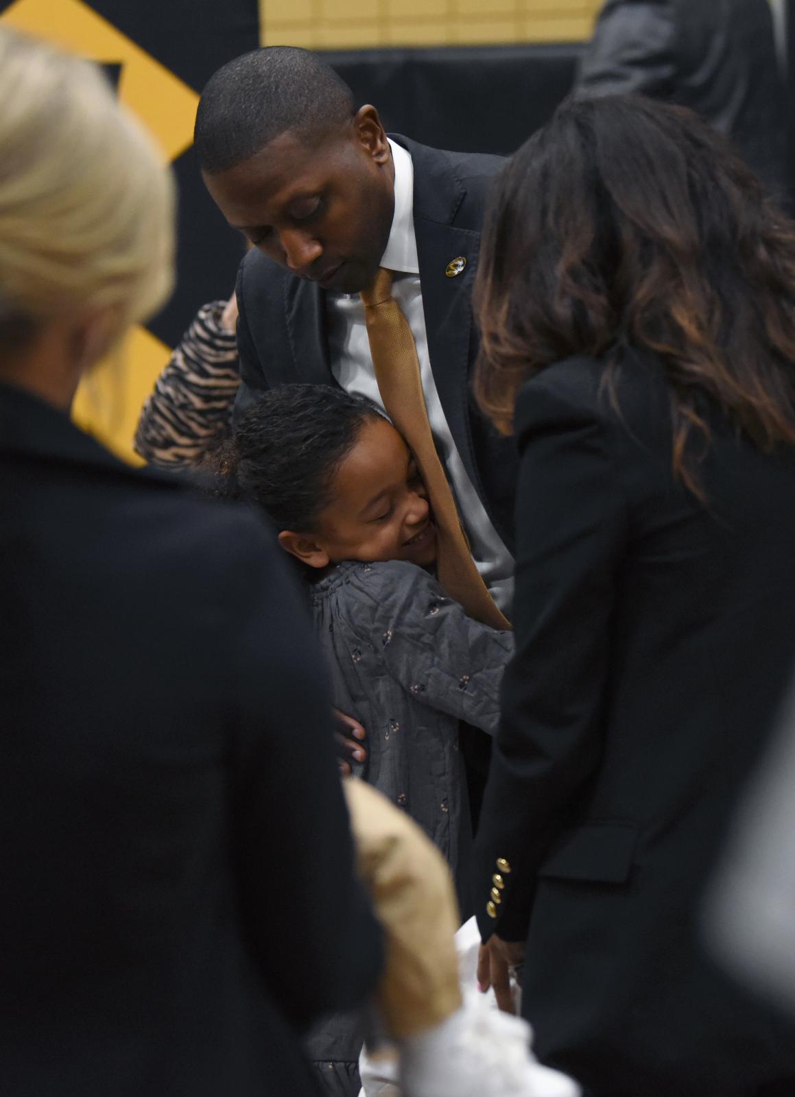 Dennis Gates hugs his daughter, Avery, on Tuesday, March 22, 2022 at Mizzou Arena in Columbia....