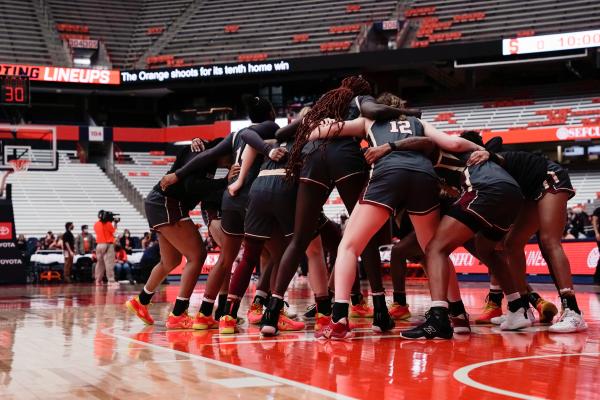 Image from Sports - Boston College huddles and gets pumped up before the SU...