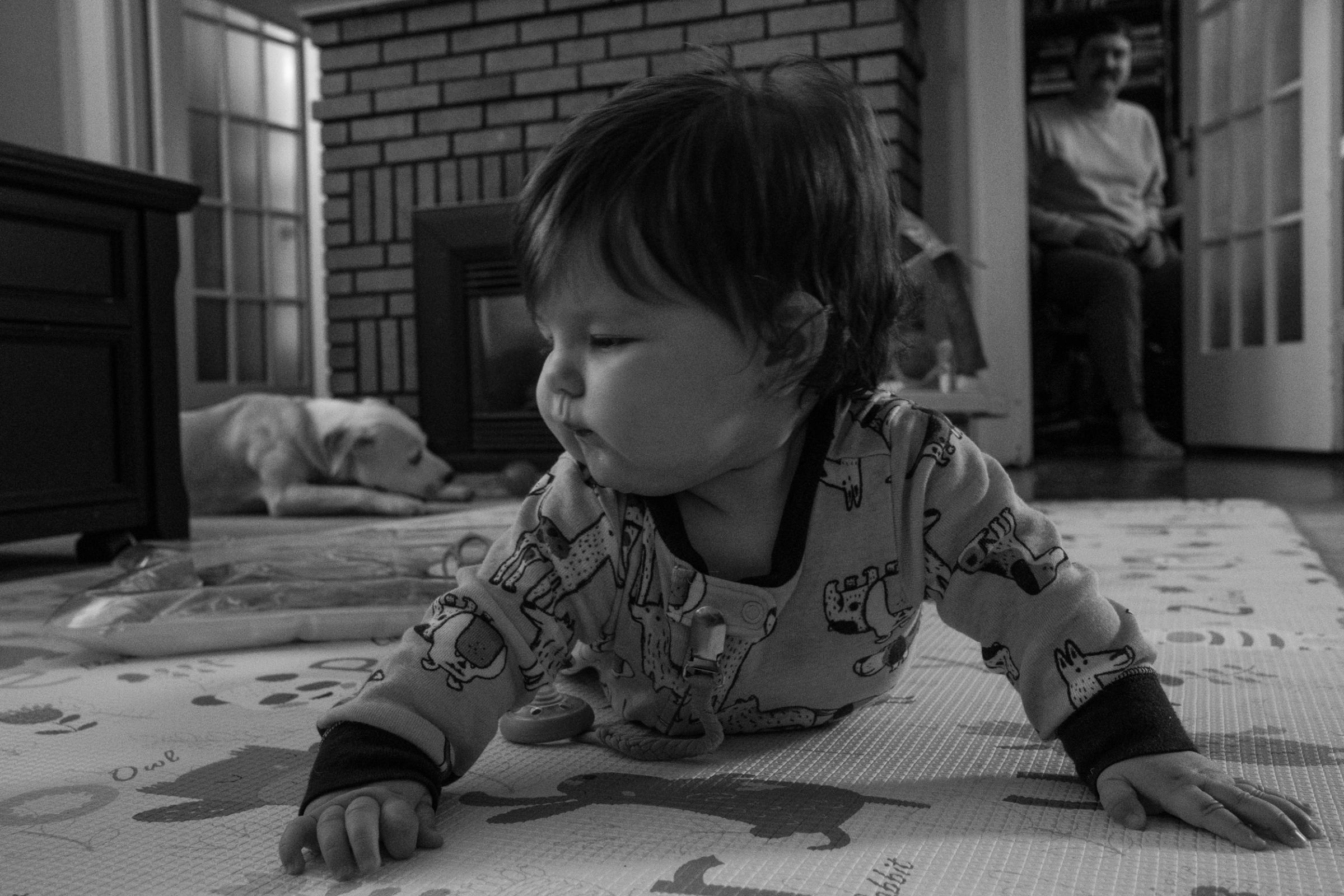 Forever and ever, no matter what - Ana Sofia playing on her mat in the morning while Andres...