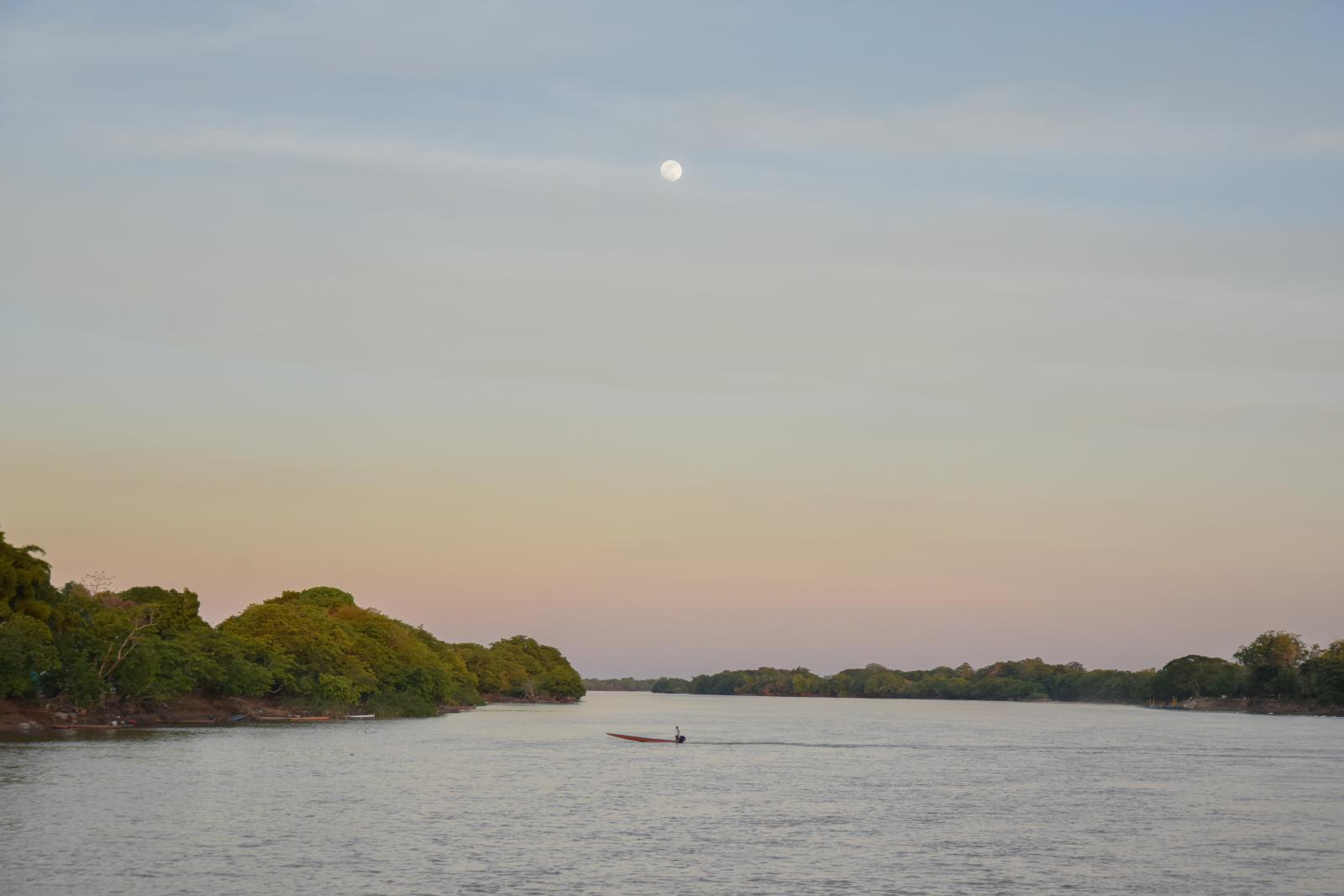 SINGLES - Full moon sunset somewhere around the Arauca river that...