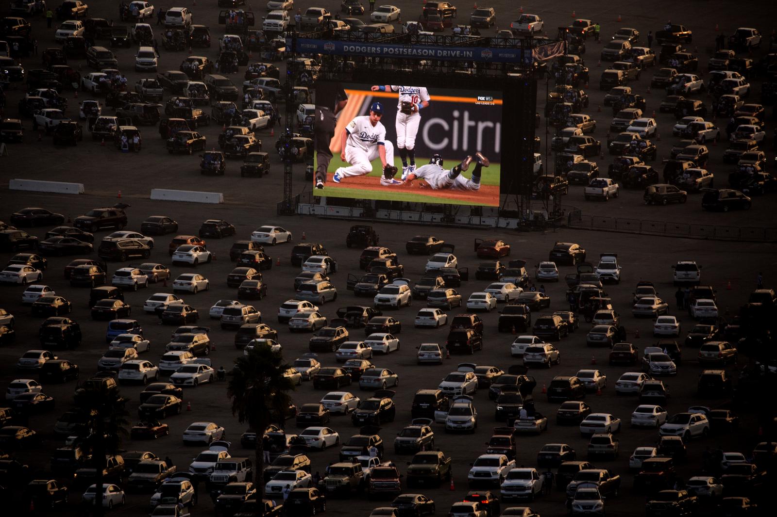 Fans watch in their cars during...es on Wednesday, Oct. 21, 2020.