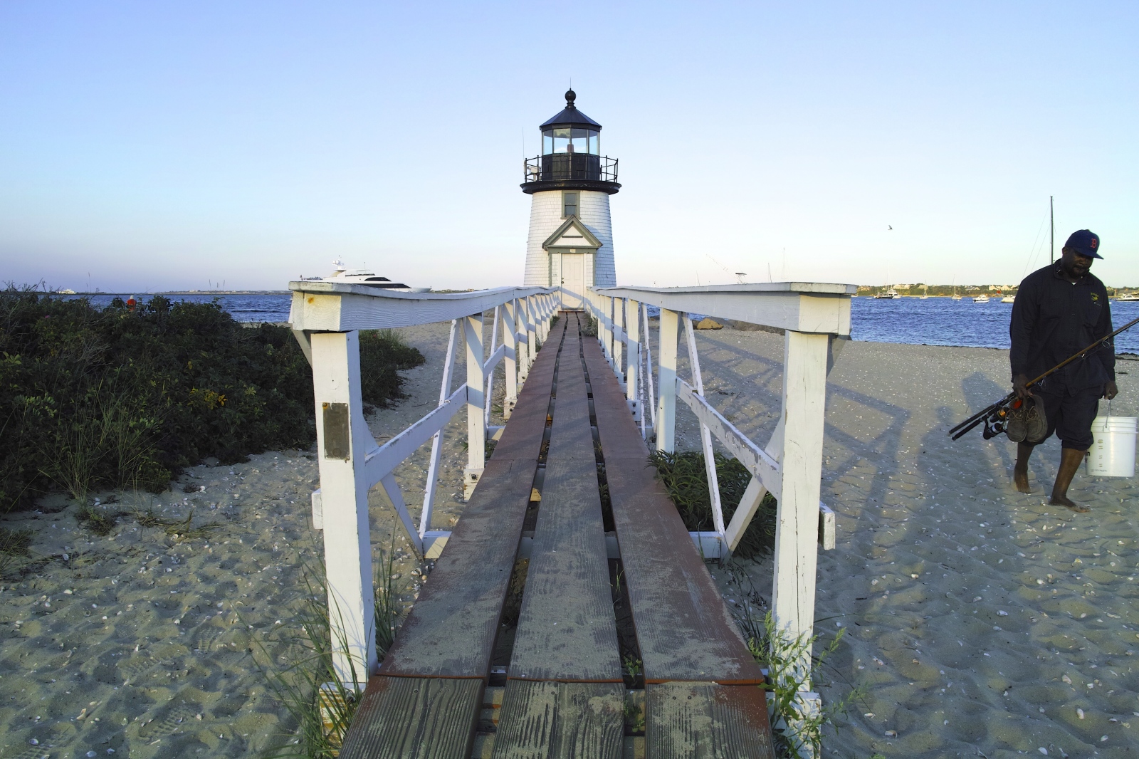 At the Water's Edge - Fisherman and Lighthouse, Brant Point, Nantucket,...