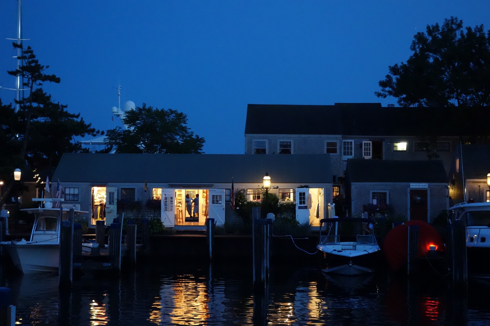 At the Water's Edge - Shops at Night on Old South Wharf, Nantucket,...