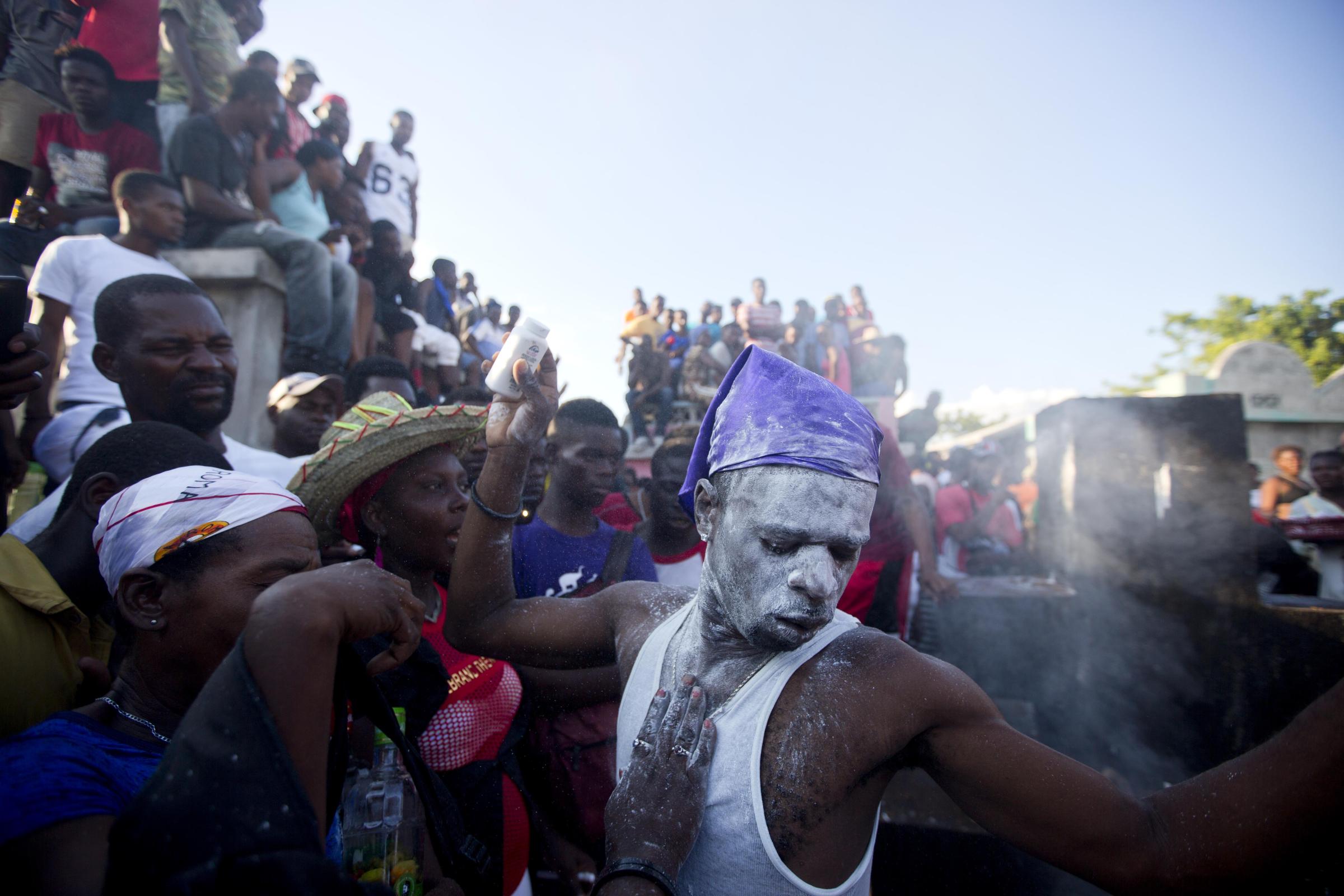 Vodou in Haiti - In this Nov. 1, 2018 photo, voodoo believers who are...