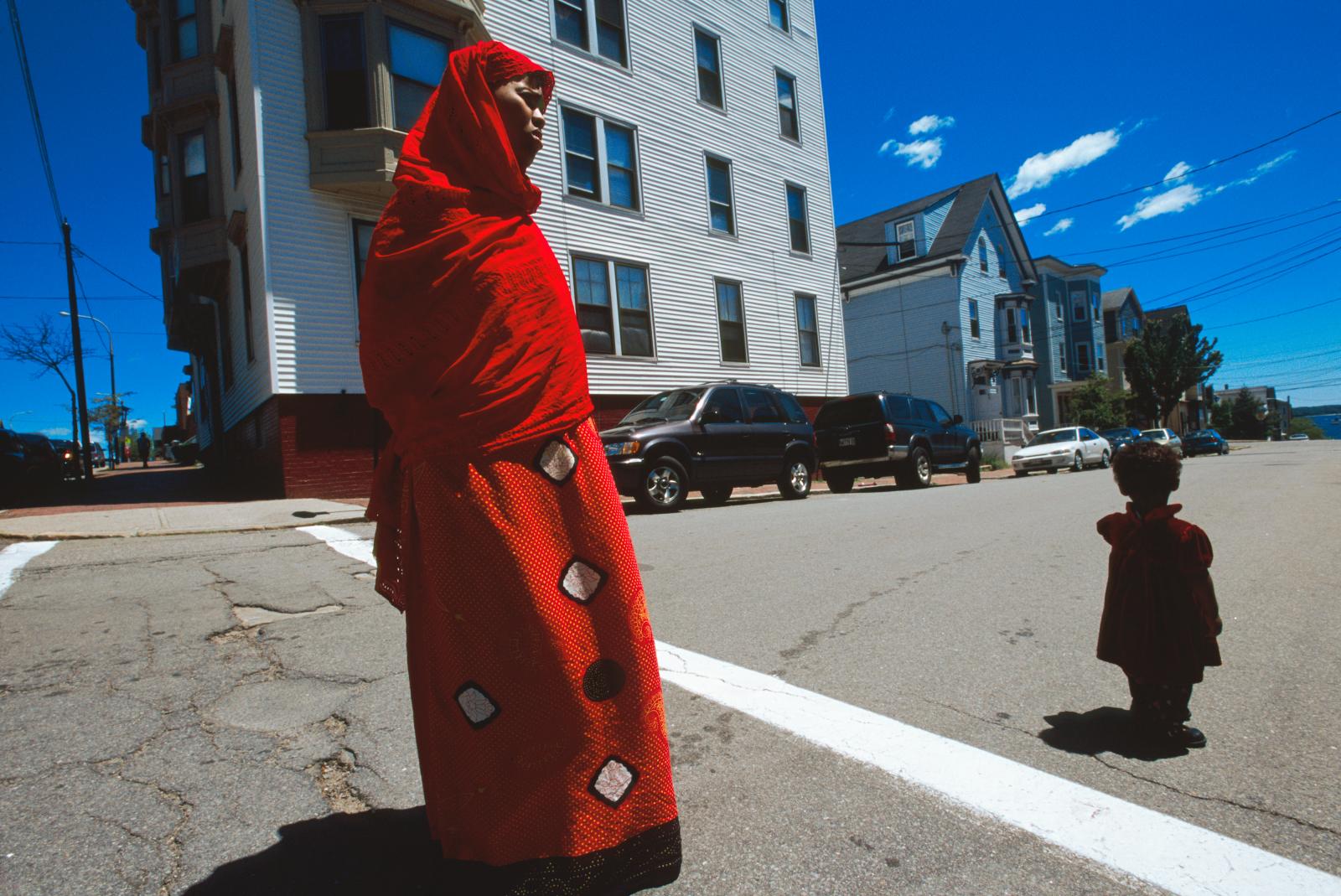 A Somali woman crosses the stre... arrived to the state of Maine.