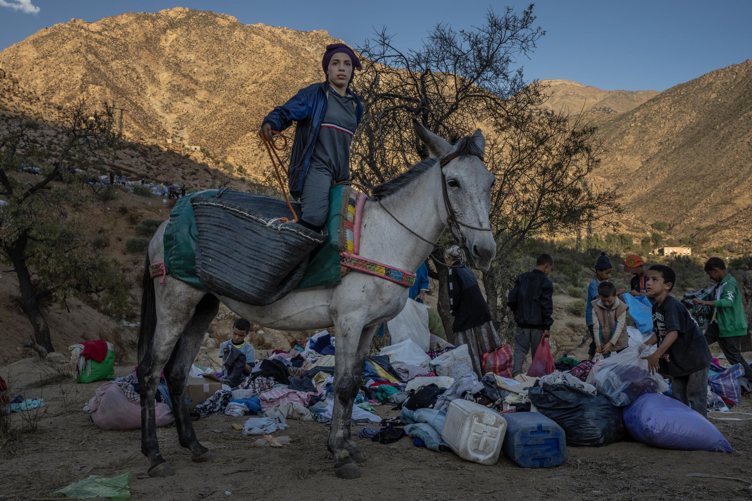 Morocco Earthquake - 15-year-old Hanna, rides her horse through the mountains...