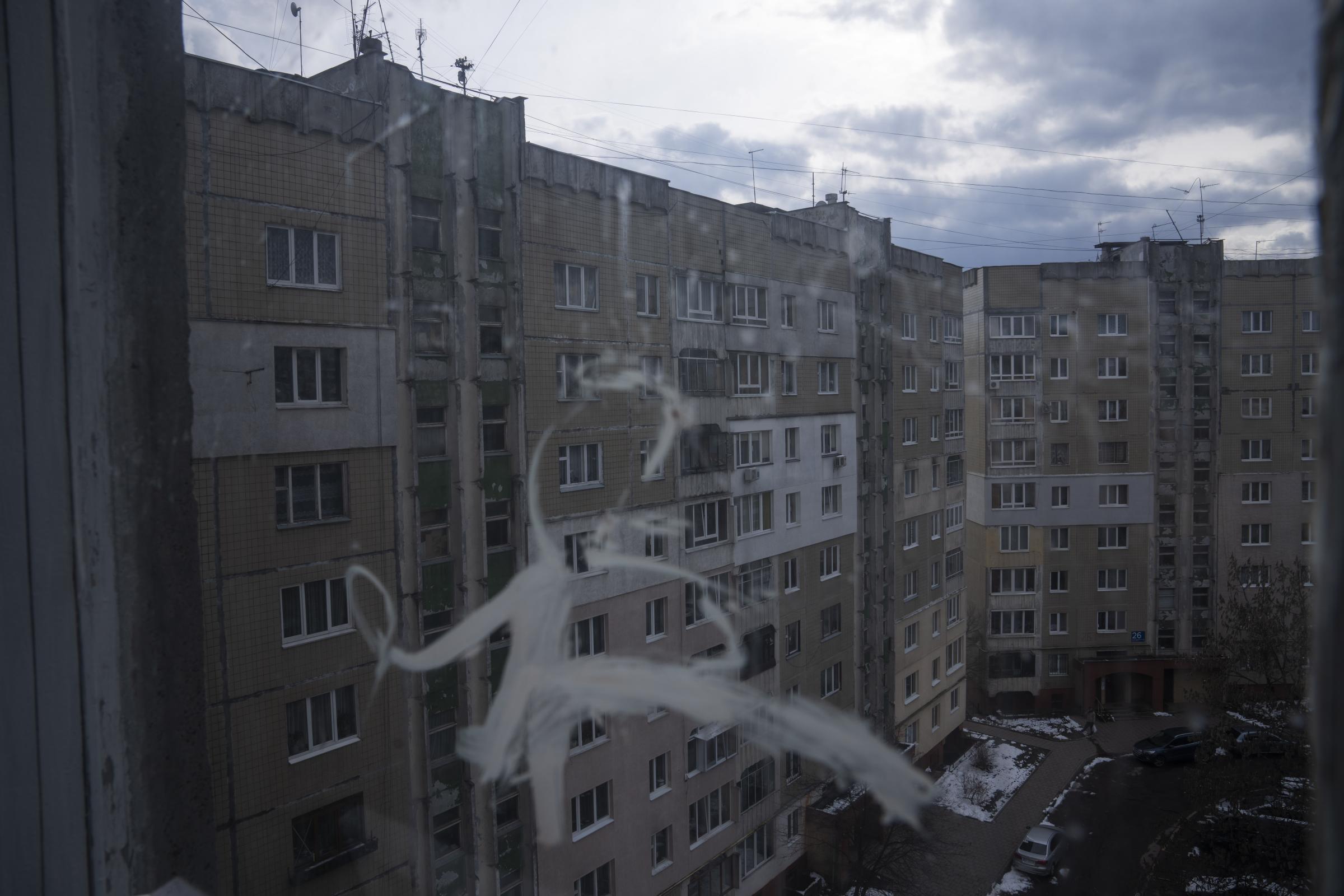 A general view of an apartment block seen from the kitchen window, where the Shlapak family, who are internally displaced from Kharkiv, took refuge.