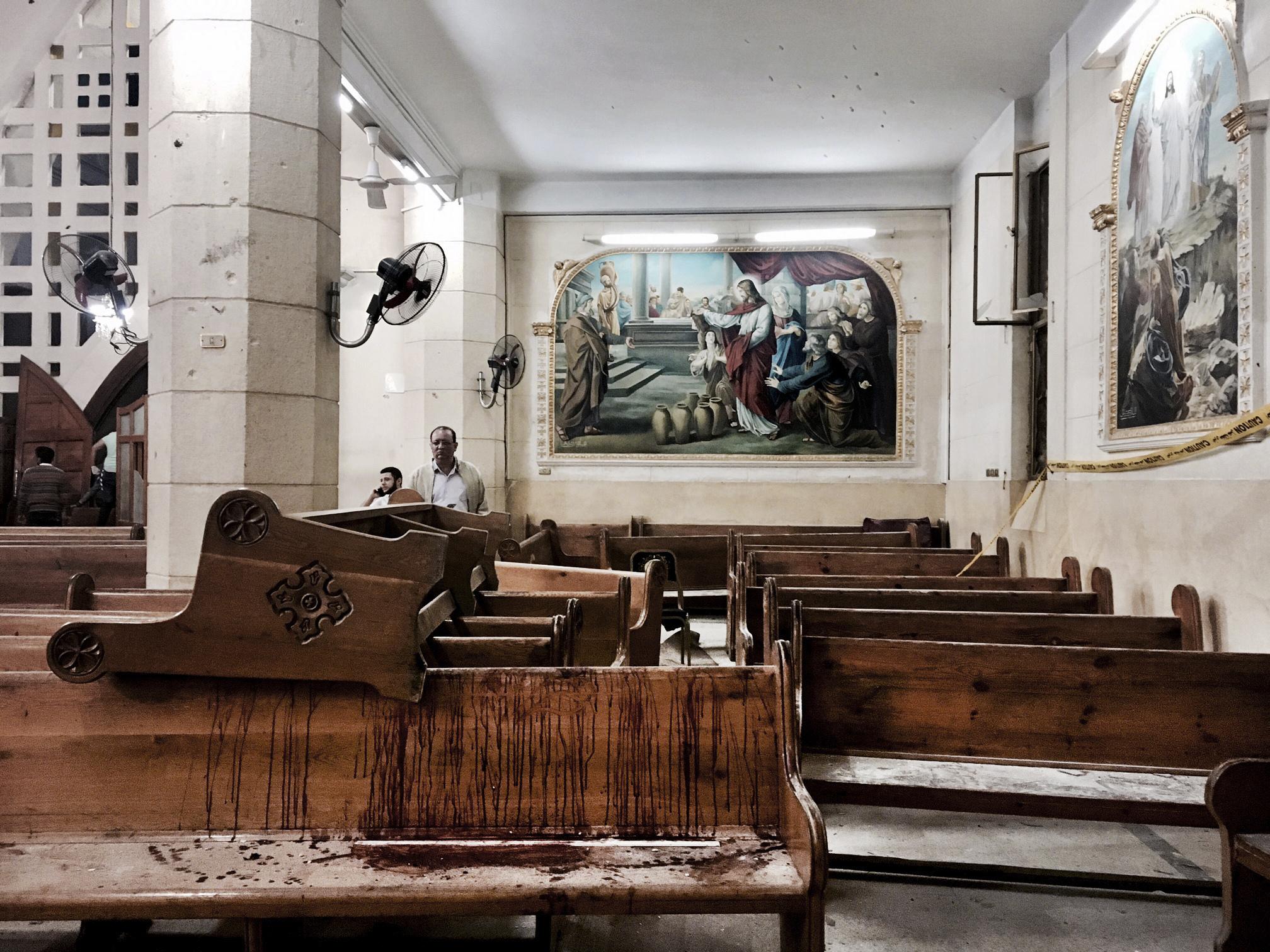  Blood stains pews inside the St. George Church after a suicide bombing, in the Nile Delta town of Tanta, April 9, 2017. Bombs exploded at two Coptic churches in the northern Egyptian cities of Tanta and Alexandria as worshippers were celebrating Palm Sunday, killing over 40 people and wounding scores more in assaults claimed by the Islamic State group.&nbsp; (iPhone Photo - security refused access) 