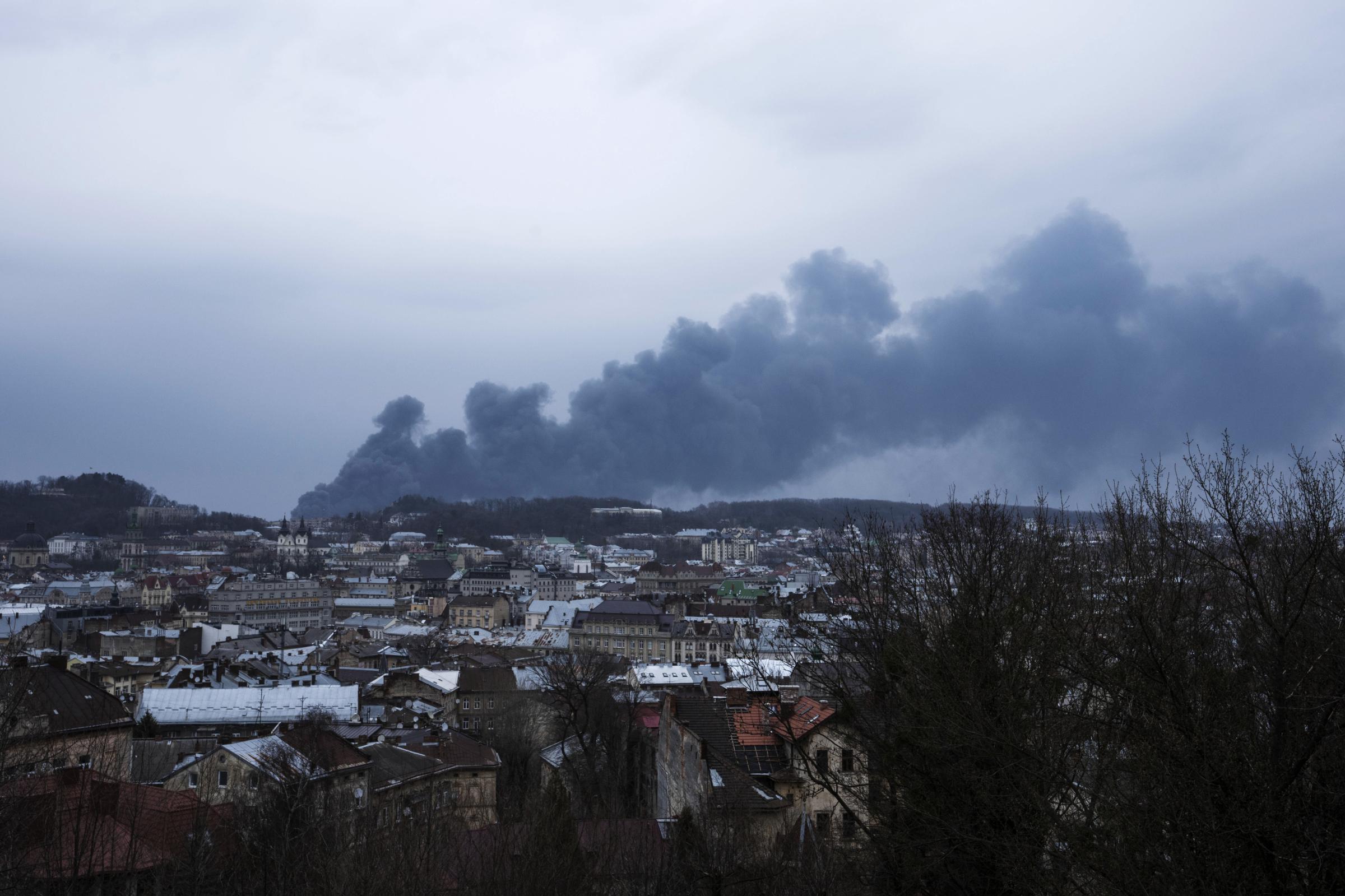 Rocket attacks hit Ukraine’s Lviv -  Smoke billows the air after Russian rickets struck Lviv. 