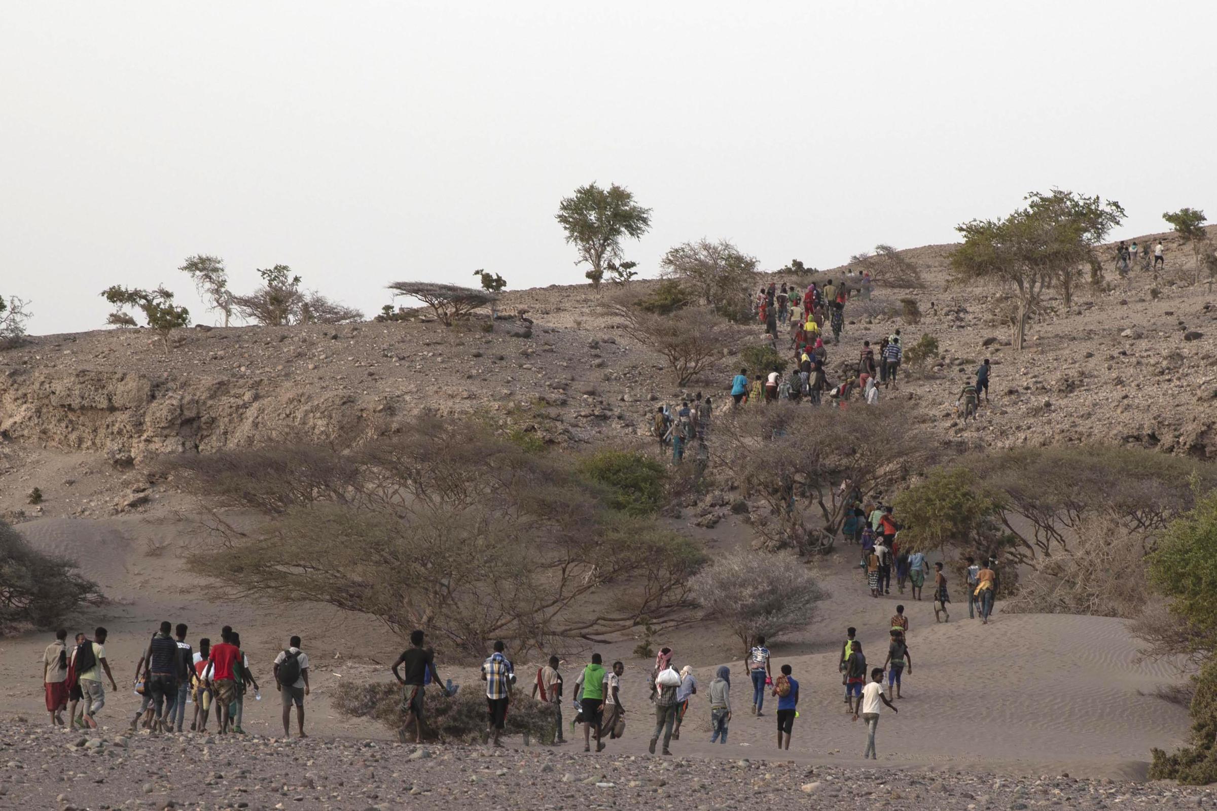  Long lines of migrants descend single file down mountain slopes to the rocky coastal plain, where many lay eyes on the sea for first time, and eventually board the boats. 