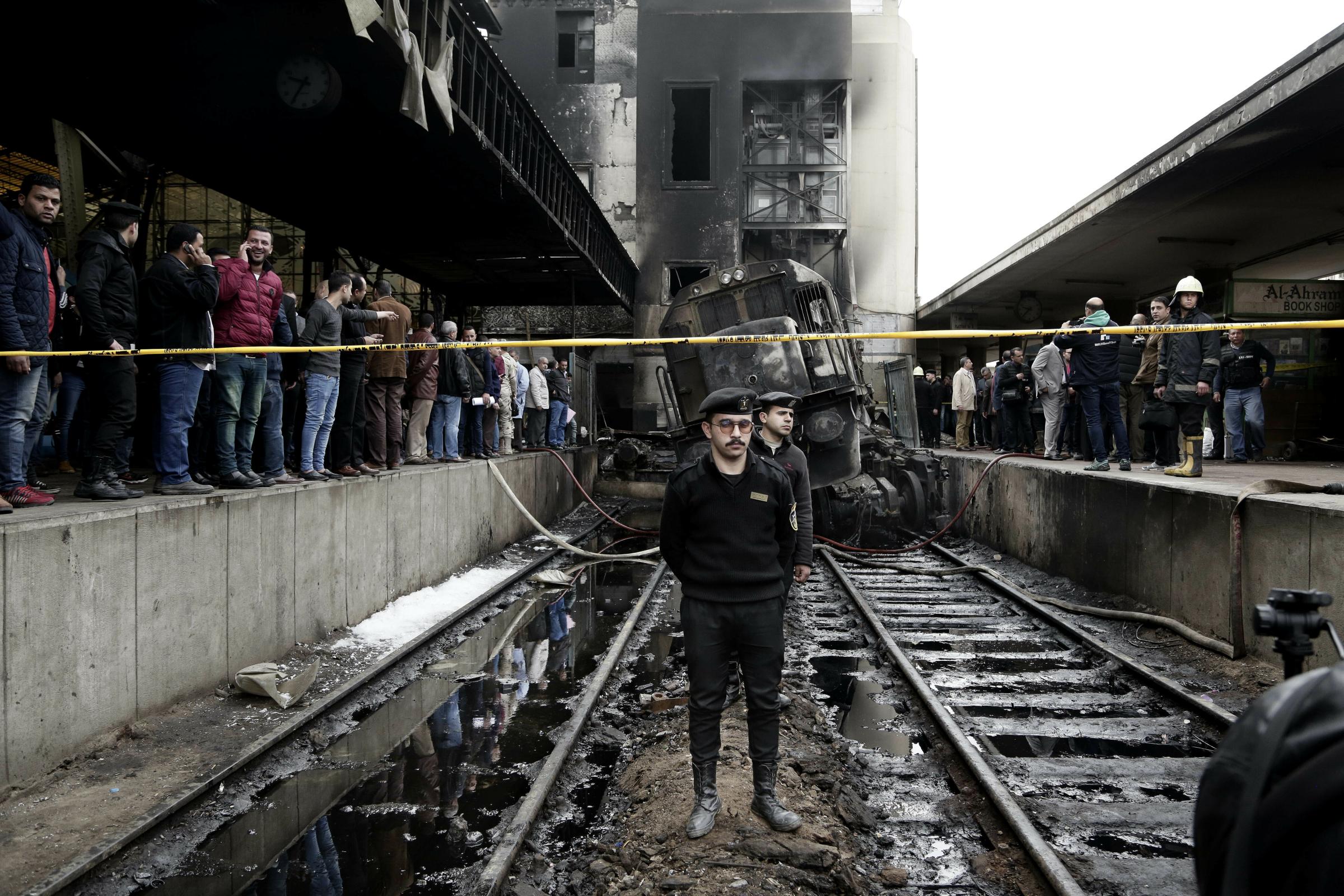 Fiery Crash at Cairo Train Station -  Policemen inside Ramsis train station. 
