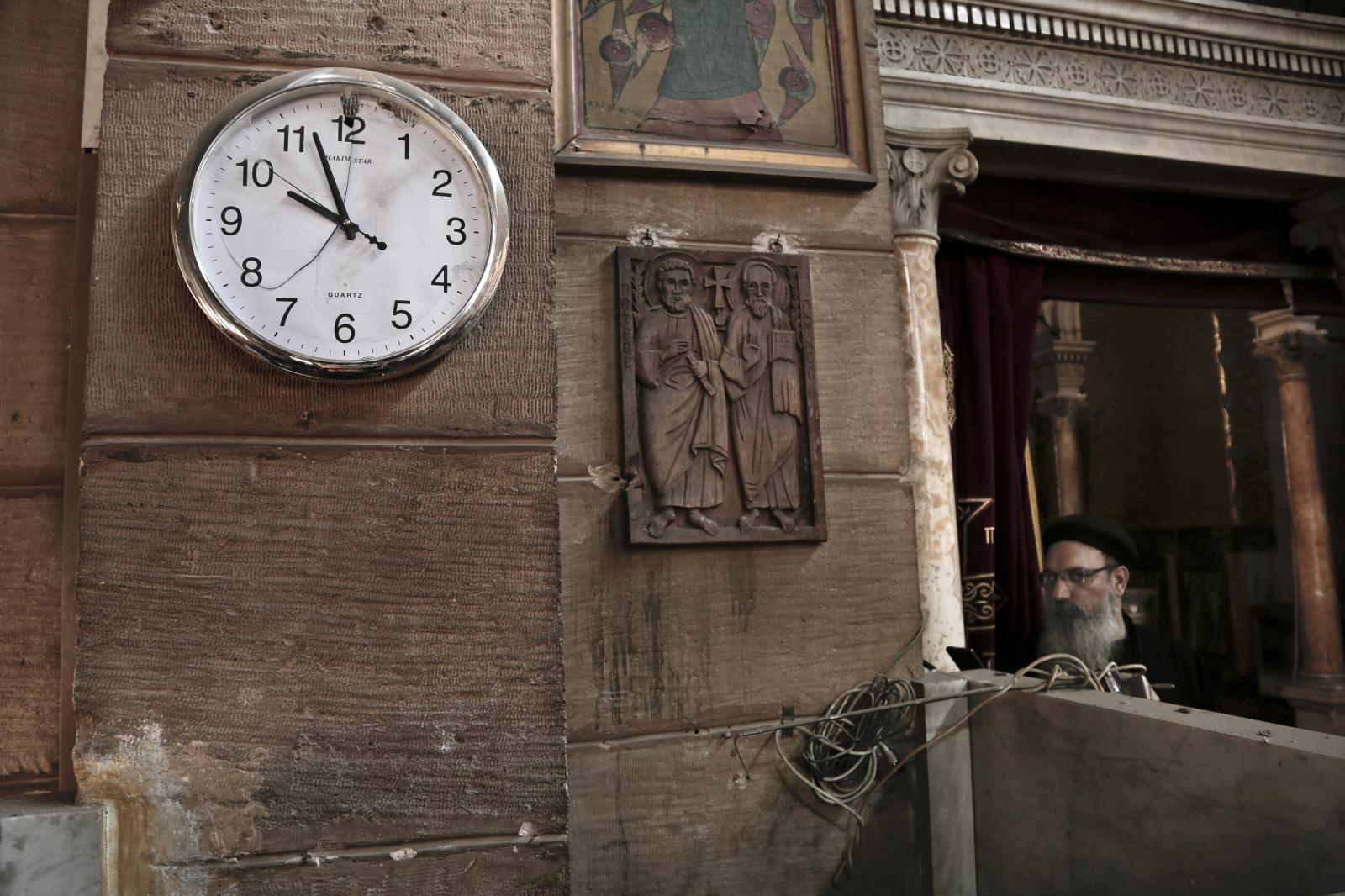  A damaged clock and Coptic cle...ous minority in recent memory. 