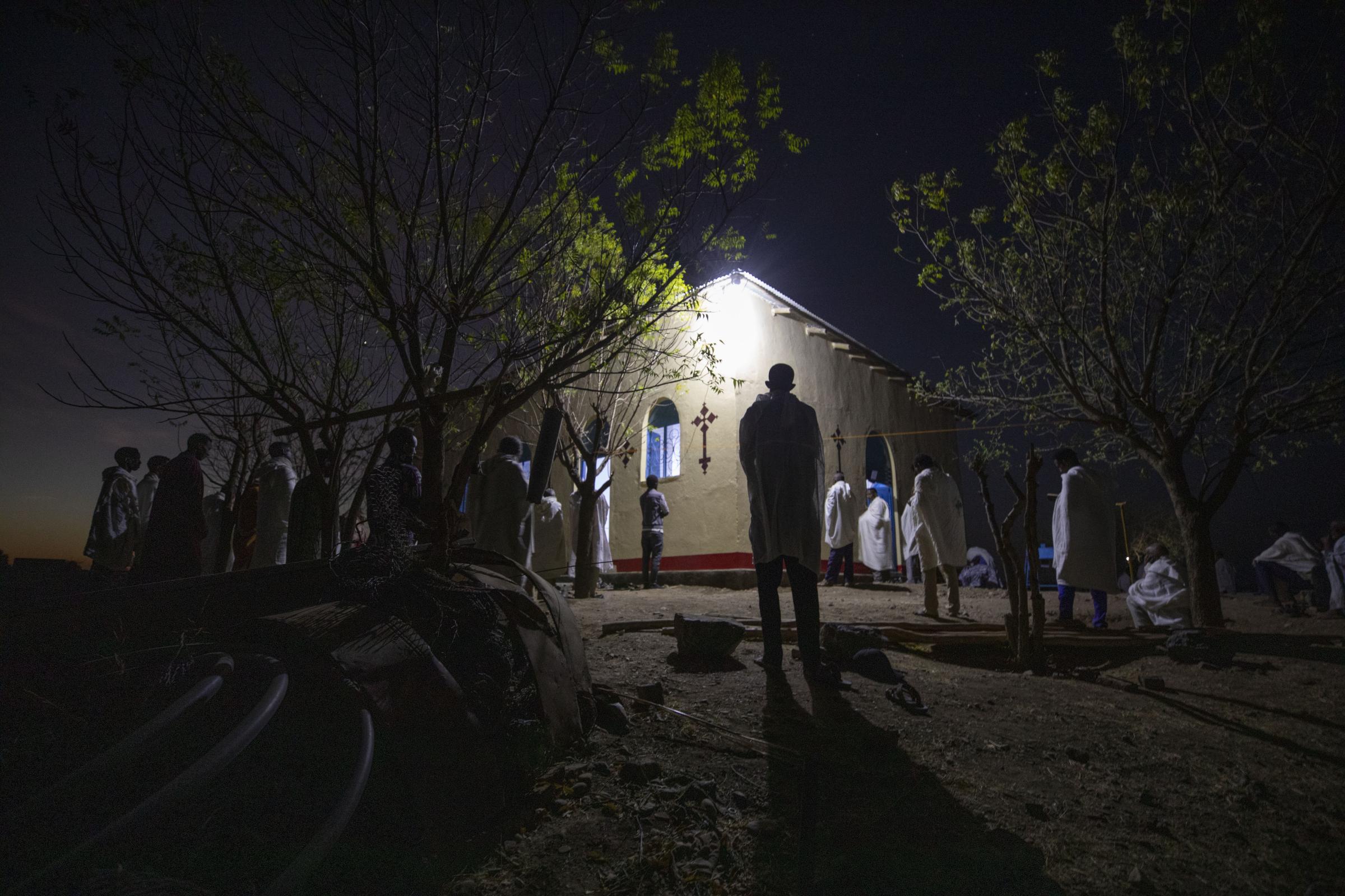  Abraha prays at a church in Hamdayet, near the border with Ethiopia. 