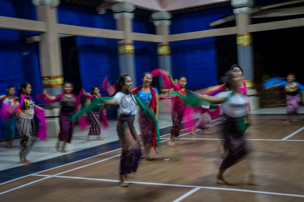 Girls dance to Balinese gamalan...ud, Bali, Indonesia, July 2015.