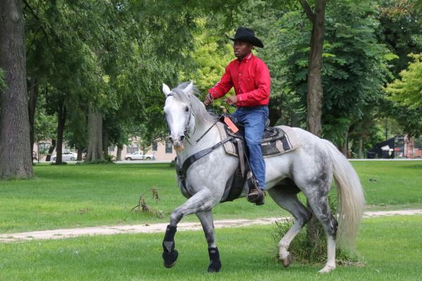 Chicago's Black Cowboys - A horse get ridden around the park in preparation for the two hour group ride around the city