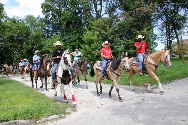 Chicago's Black Cowboys - The cowboys and cowgirls on the start of their group ride in Washington Park group where they...