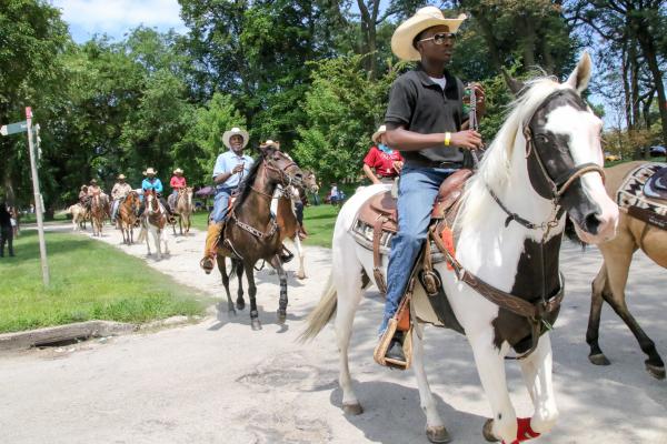 Chicago's Black Cowboys - The cowboys and cowgirls on the start of their group ride in Washington Park group where they...