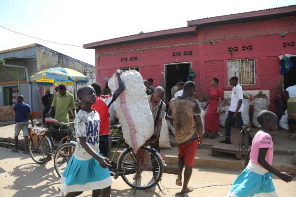 Bujumbura - City in the Heart of Africa - Food and other goods are brought in to the Kamange neighborhood for resale; food is purchased in...