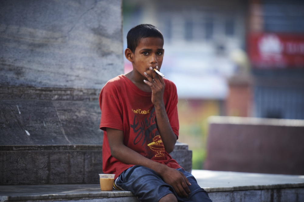  Suraj (14) is dreaming of beco...their hands filled with money. 