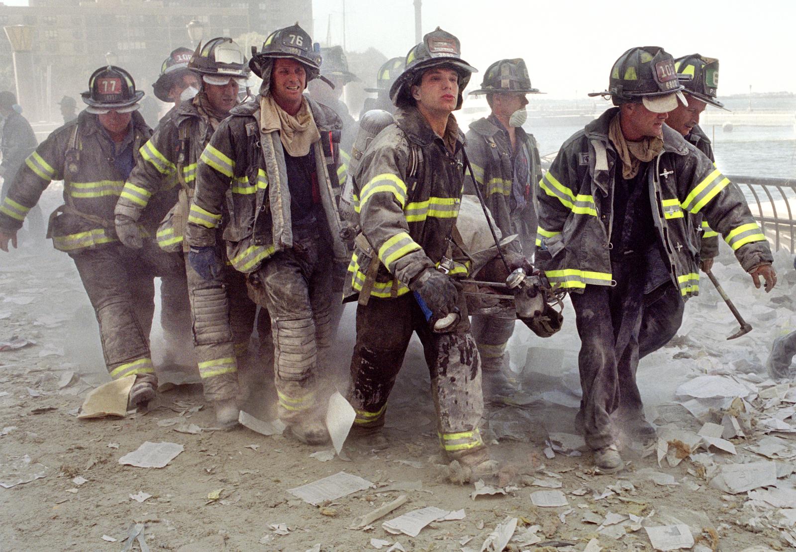 FDNY firefighters carry fellow ...er on Sept. 11, 2001.&nbsp;