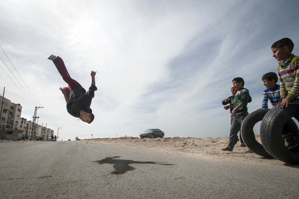  Uday Ajrami of '3 Run Gaz...9;. Parkour in the Gaza Strip. 