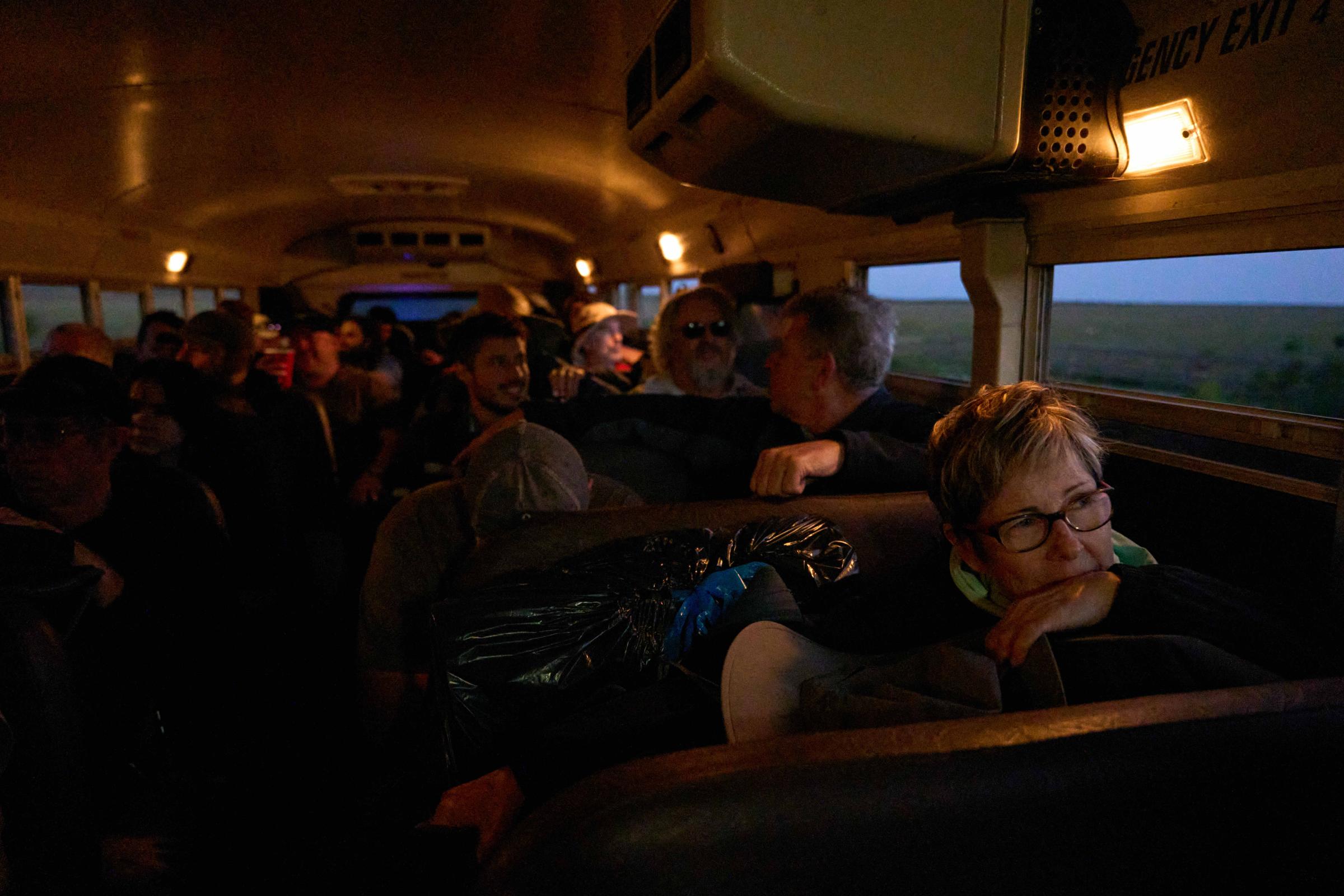Rocket Ranch - People on board of the Astrobus ride towards the viewing...