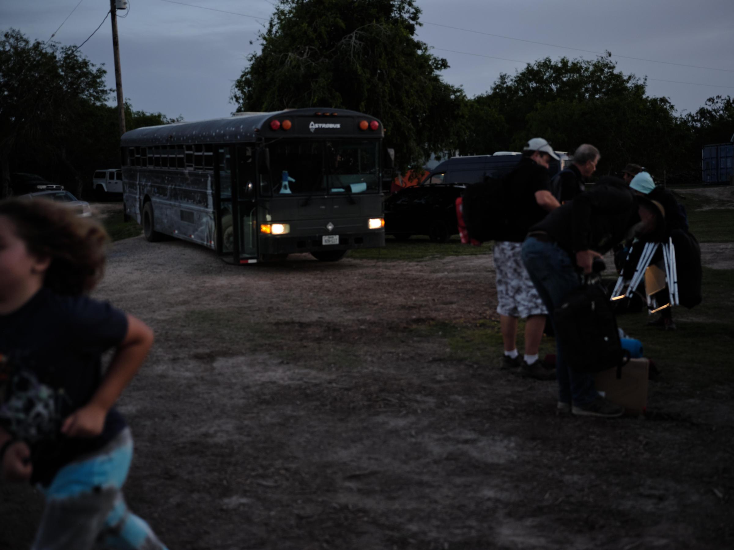 Rocket Ranch - Spectators get ready to board the Astrobus to camp out at...