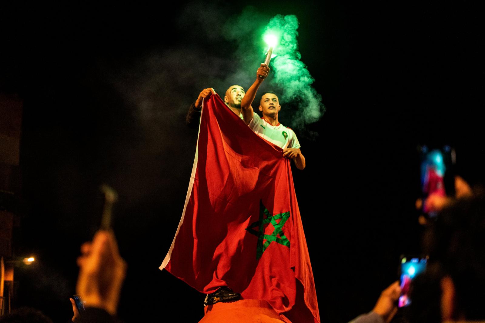 Overview - Moroccan football team supporters celebrate their win...