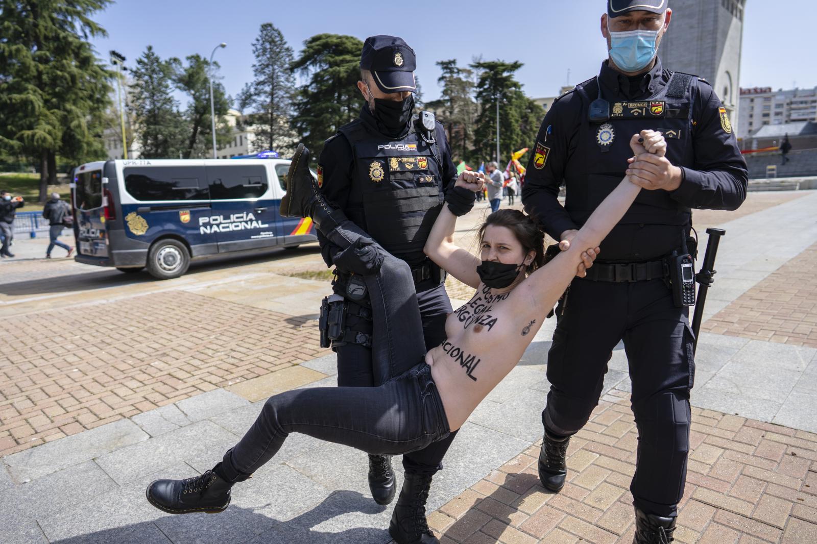 Overview - Activists from Femen Spain burst into an event organised...