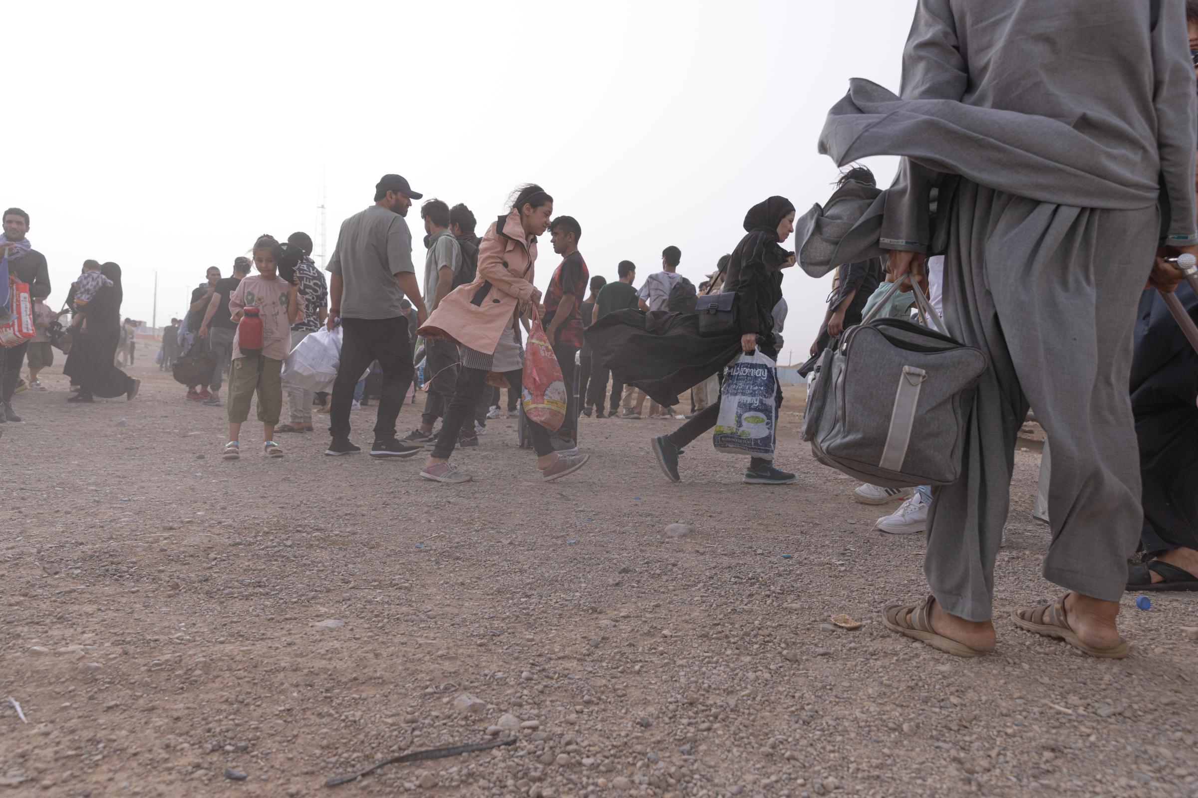 Returning Afghans -   