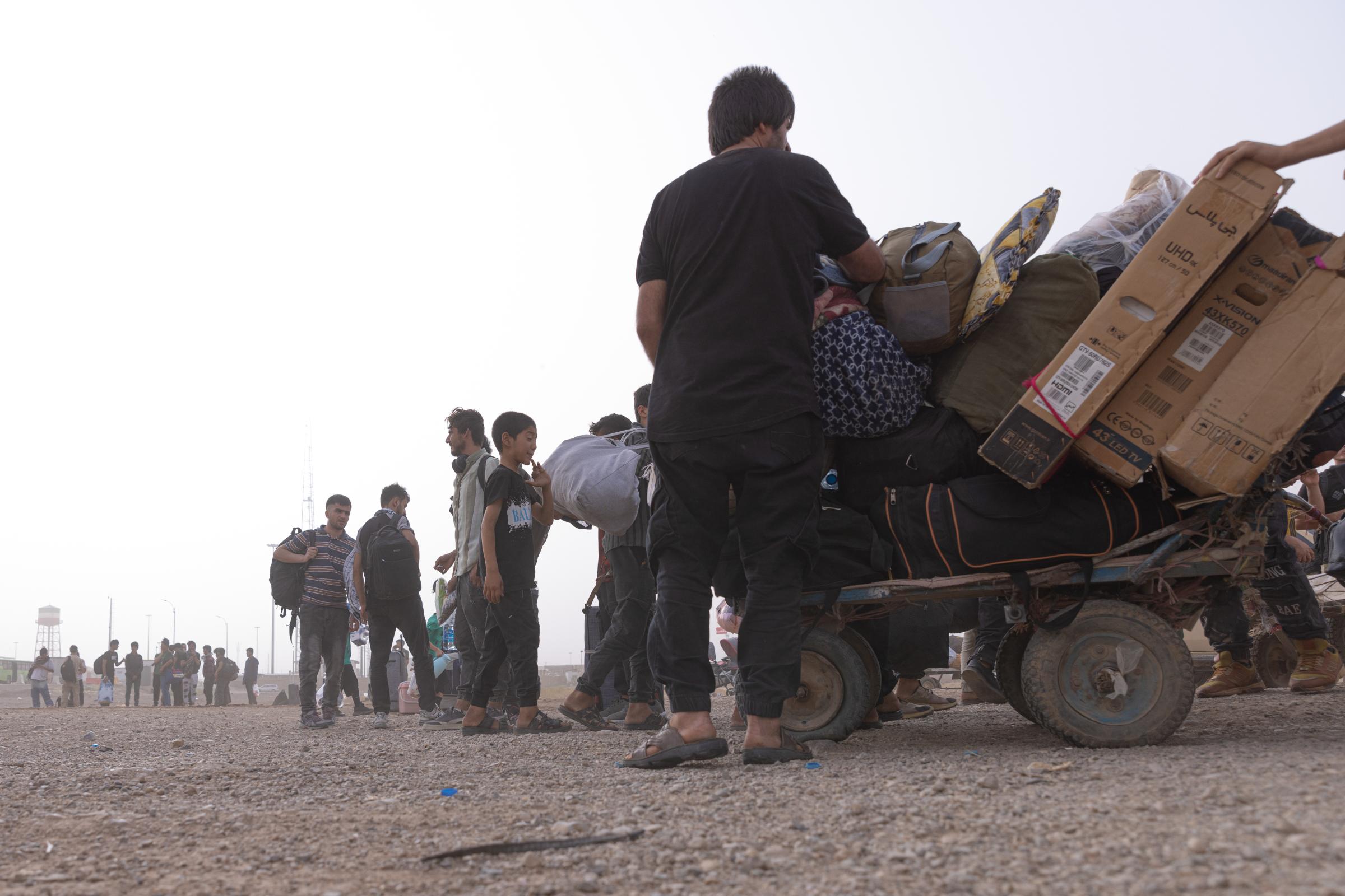 Returning Afghans -   