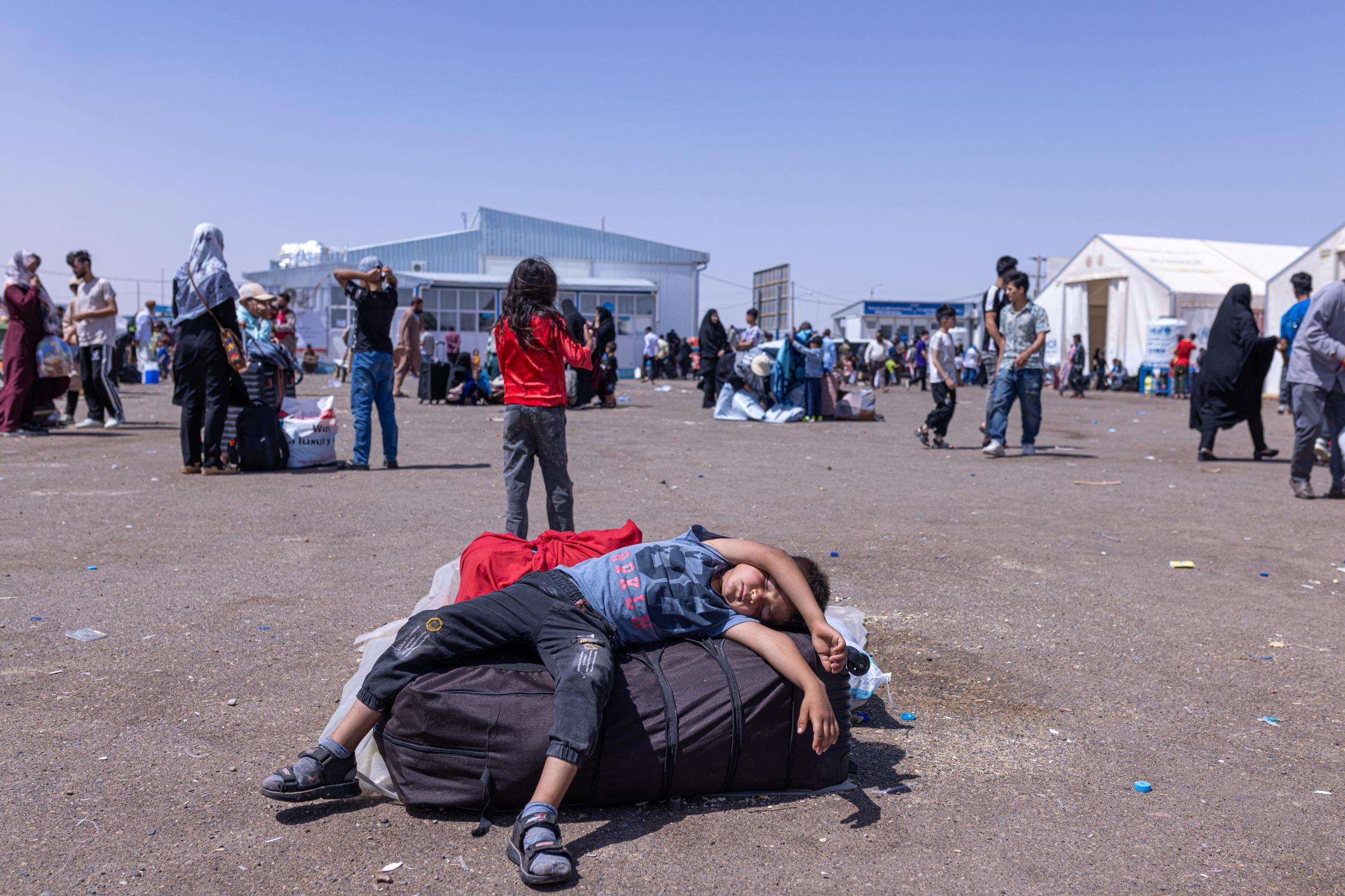 Returning Afghans -   