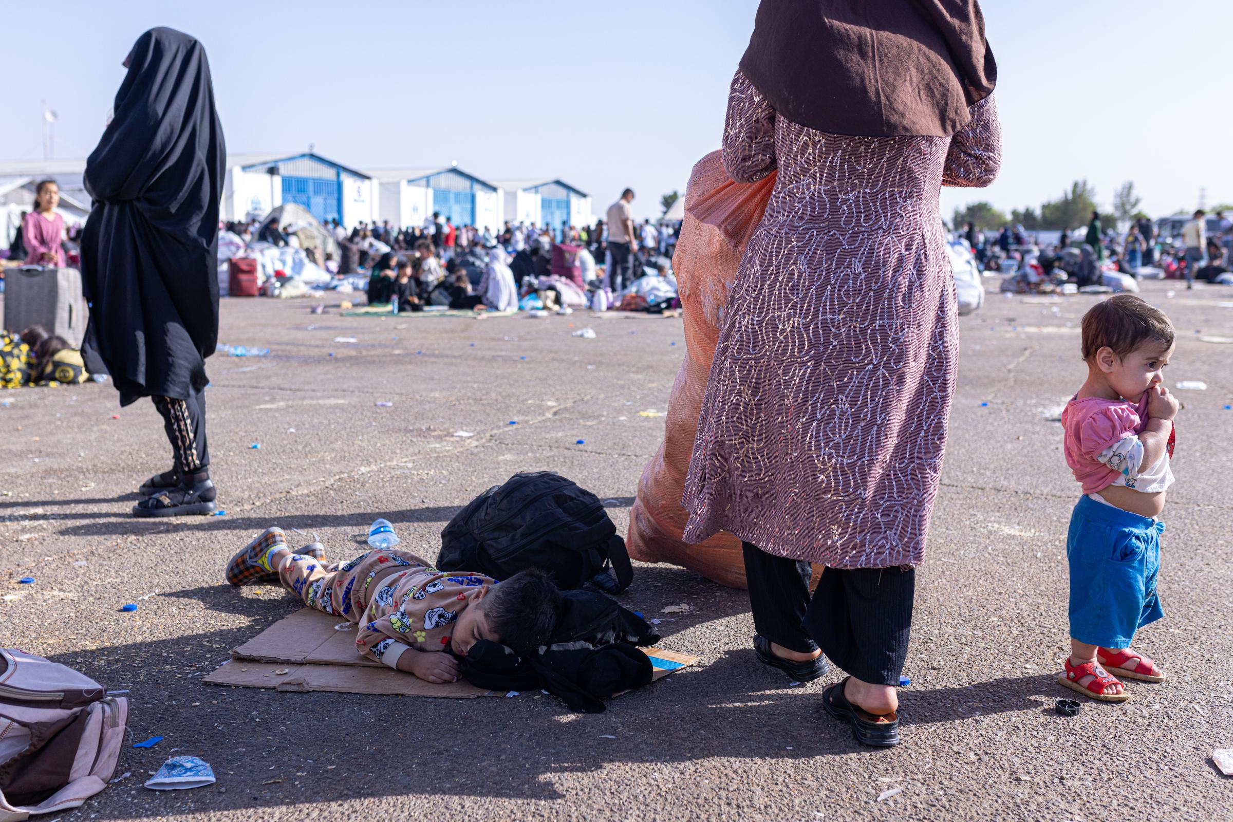 Returning Afghans -   