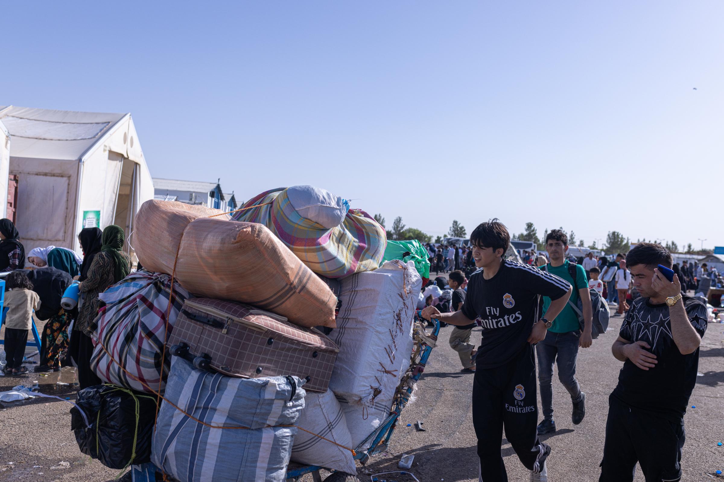 Returning Afghans -   