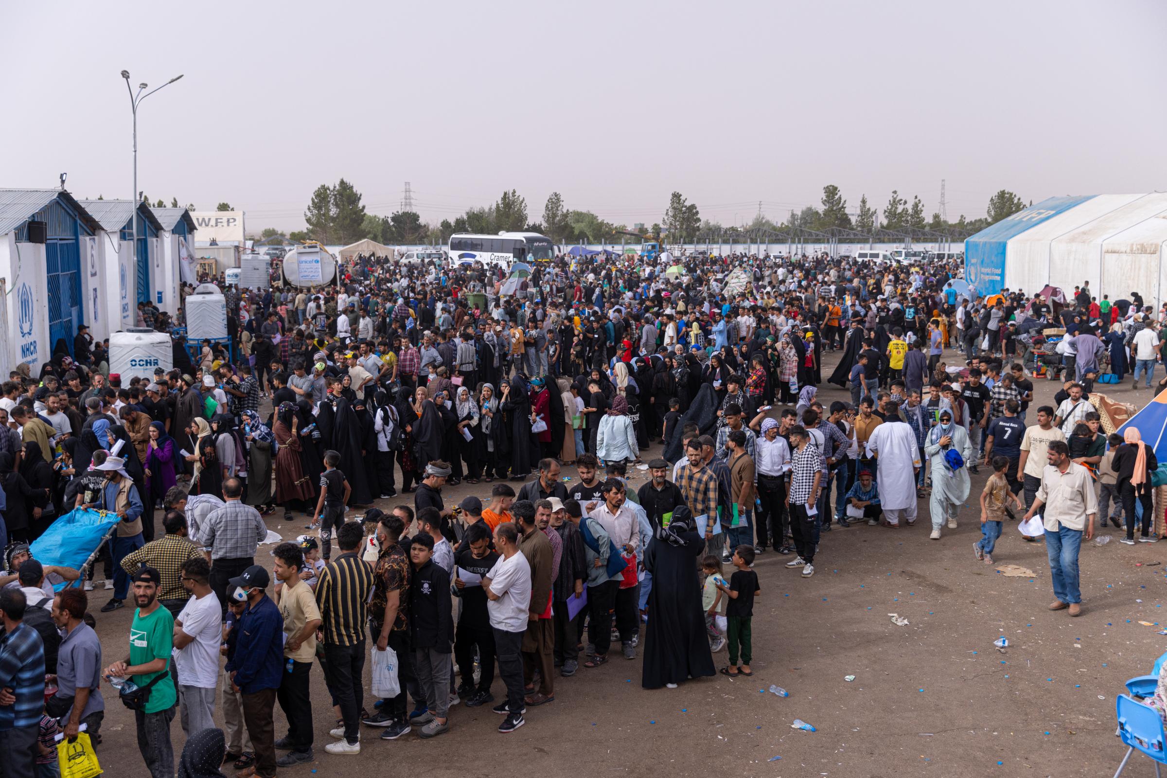 Returning Afghans -   
