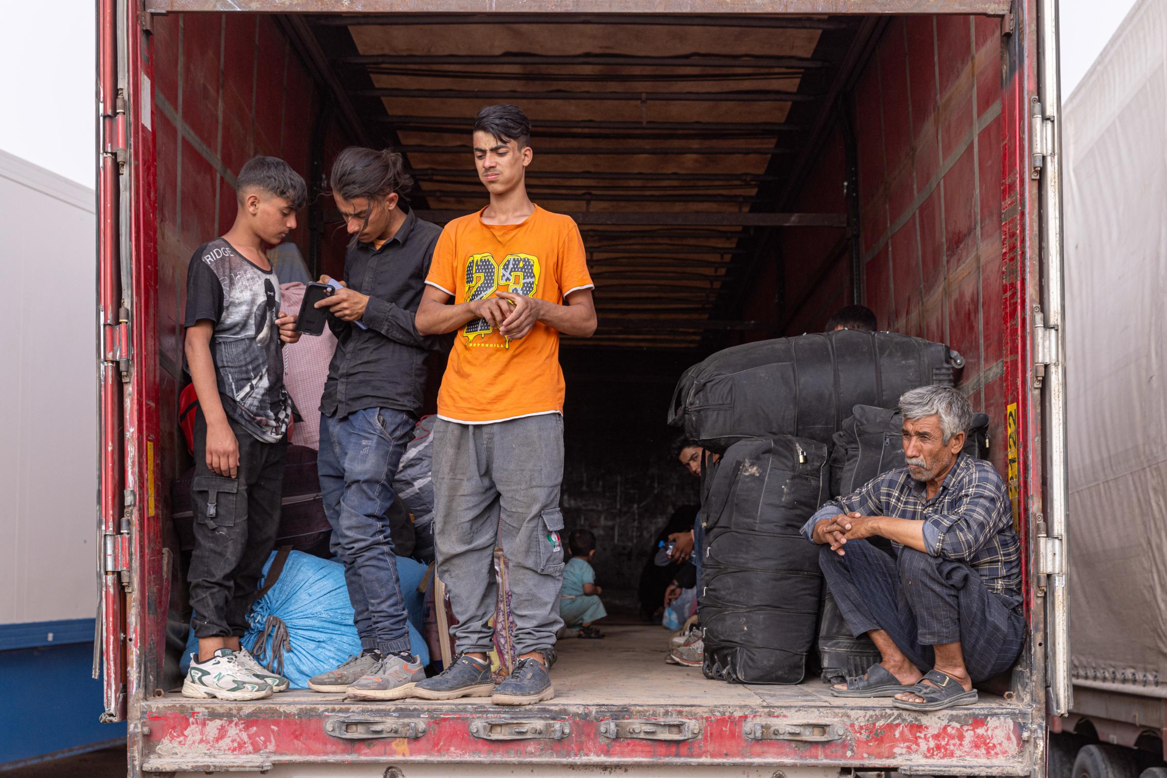 Returning Afghans -   