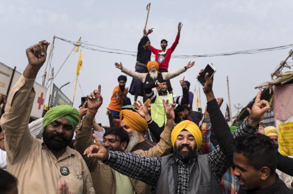 Image from News Coverage - Farmers celebrate after India's Prime Minister...