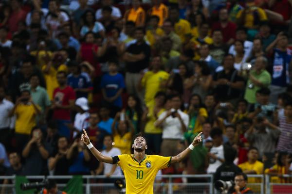Sports - Brazil's Neymar celebrates after scoring a goal...