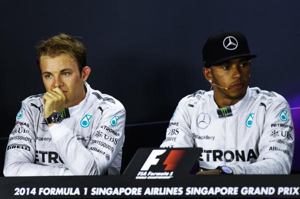 Sports - Mercedes Formula One drivers Nico Rosberg of Germany (L)...