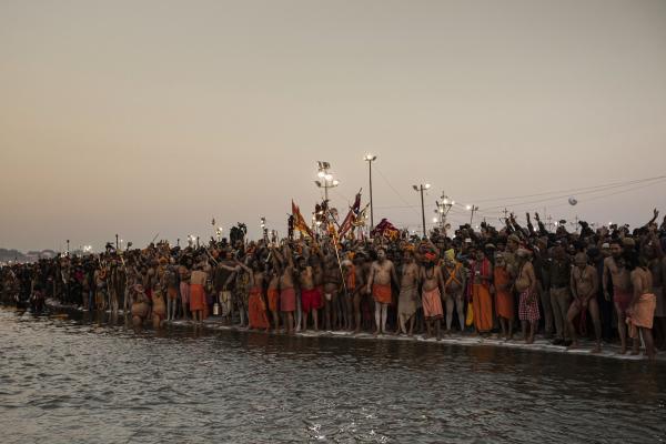 Religion and Festivals - Indian sadhus (Hindu holy men) wait to bathe at Sangam --...