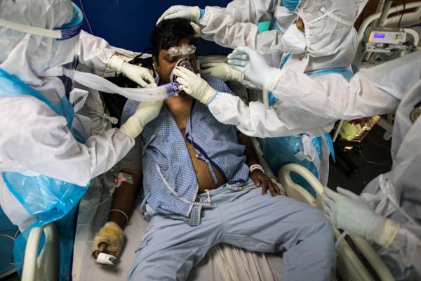 India's Covid-19 pandemic - Doctors and nurses wearing Personal Protective Equipment...