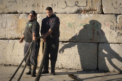  Fishermen securing their boat at Gaza Port,Gaza City 