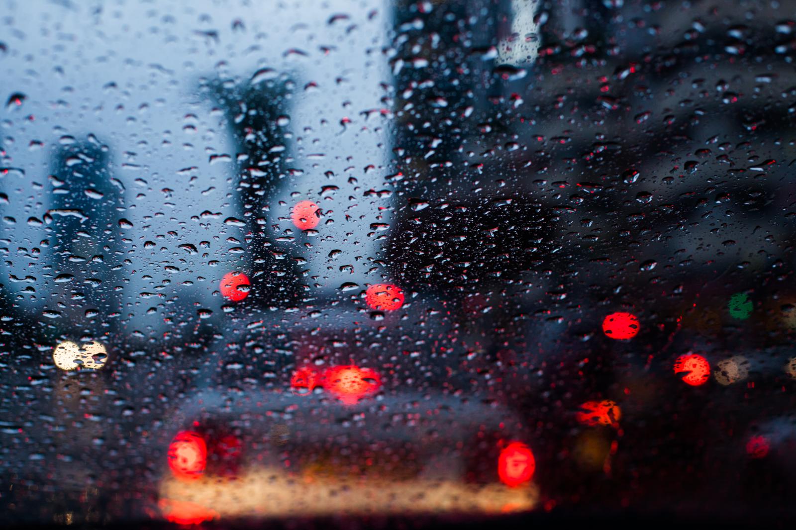 Night traffic at rainy evening. | Buy this image